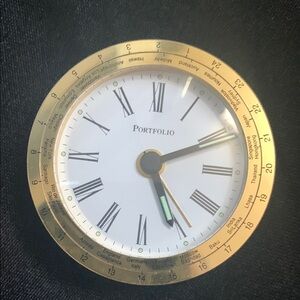 Gold and White Roman Numeral travel alarm Clock by Tiffany & Co.